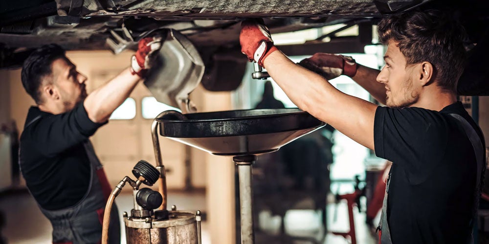 Oil change service being performed